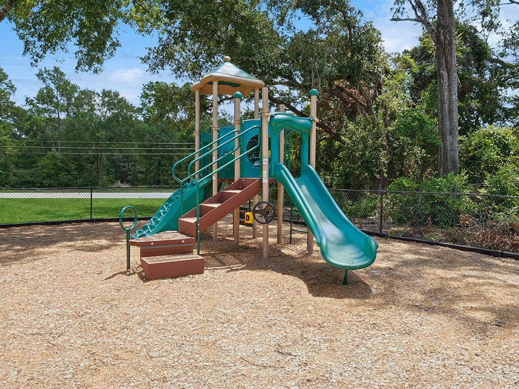 Playground at Park Village Apartments in Conroe TX